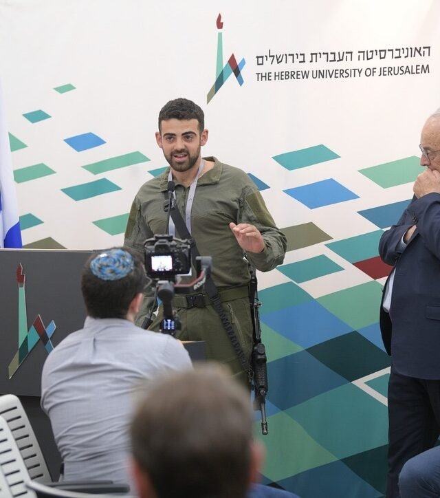 Yona Shemesh Speaking at a Hebrew University Conference during reserves