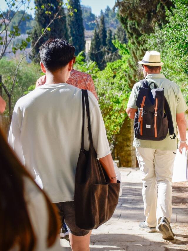 Guests walking a quiet Jerusalem lane on a private tour