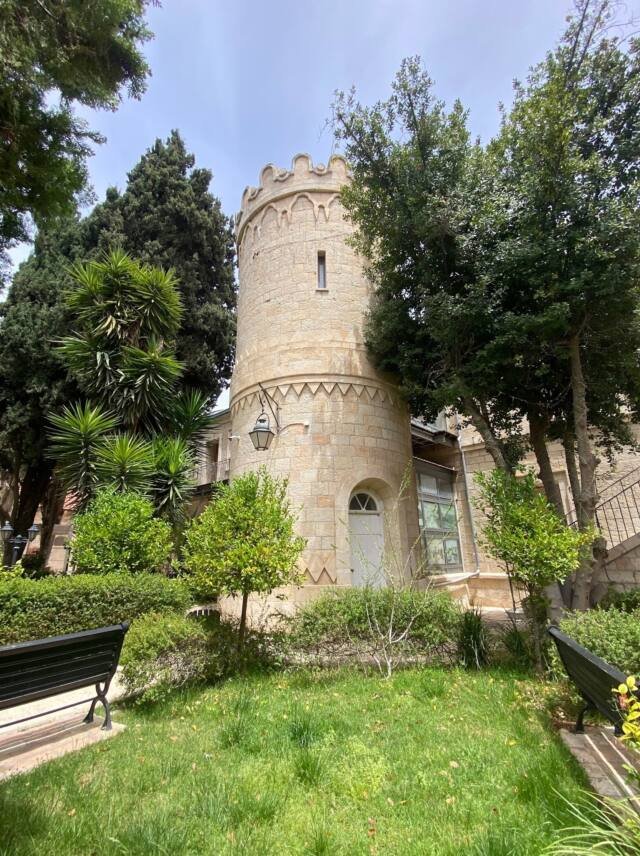 A stone turret among the trees on Nevi'im Street, Jerusalem